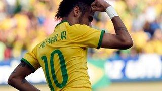 Neymar celebrates wearing the number 10 shirt