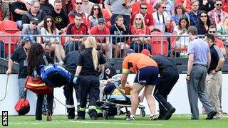 Scotland flanker Alasdair Strokosch is stretchered off against Canada