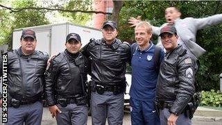 USA coach Jurgen Klinsmann (second from left) and striker Clint Dempsey (top)