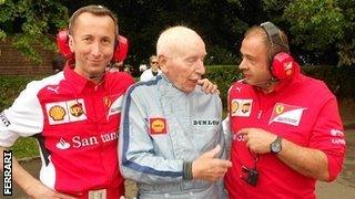 Ferrari staff with F1 legend John Surtees at Goodwood