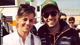 Susie Wolff poses with Sergio Perez on Saturday morning