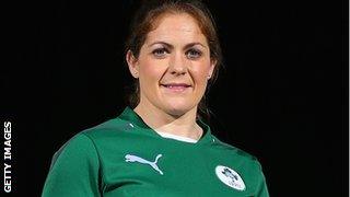 Ireland captain Fiona Coghlan poses with the Six Nations trophy at the launch of the 2014 tournament