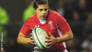 Rebecca De Filippo carries the ball for Wales in a 2012 Six Nations match against England