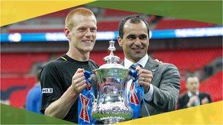 Wigan Athletic's Ben Watson and Roberto Martinez lift the 2013 FA Cup