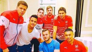 Alexis Sanchez and team-mates