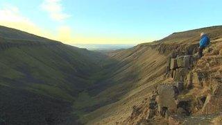 extreme wide shot of Paul Rose along the Pennine Way