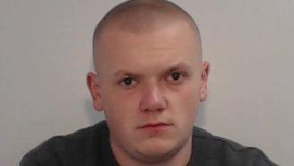 Police custody shot of Nicholas Knowles