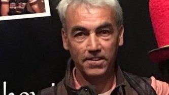 A close up picture of Eddie Fewings. He has short grey hair and is wearing a jacket.