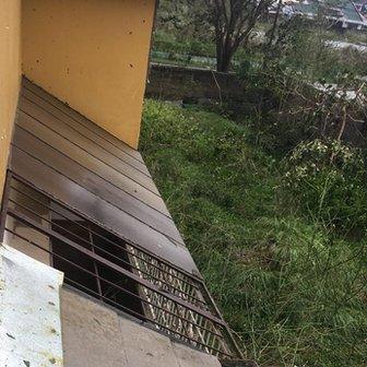 Roof blown off the Lasam Family house