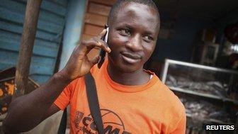 Man on the phone in Sierra Leone