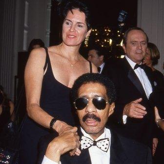 Richard Pryor with wife number four and seven, Jennifer Lee. Bob Newhart is in the background