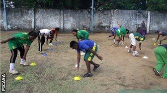 Tanzanian women in practice.