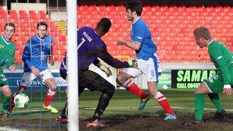 Philip Lowry puts Linfield into the lead against Ballinamallard