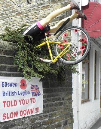 The cyclists will fly past hundreds of bikes painted yellow throughout Yorkshire, and in Silsden there is a warning to those speeding ahead of the crowd