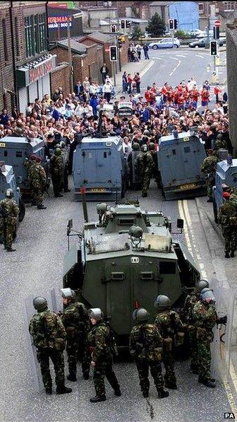 Security forces seal off the bottom of Garvaghy Road