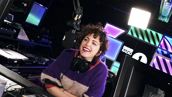 Annie Mac near DJ stand