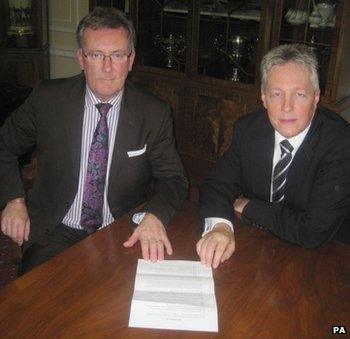 Mike Nesbitt (UUP) and Peter Robinson (DUP) hope to provide an alternative to street protests