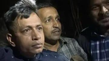 Photo of Mohammad Shariful Islam Shehzad being taken into police custody