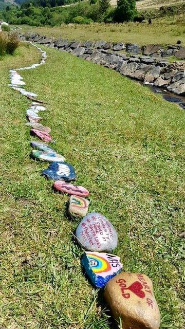 The stones painted with messages