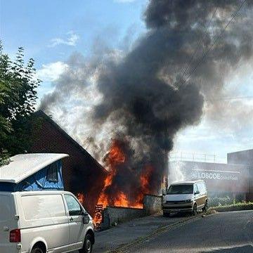 Flames and smoke coming from the building