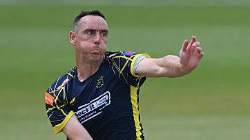 Kyle Abbott of Hampshire bowls
