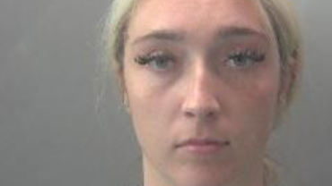 A custody photo of a blonde women