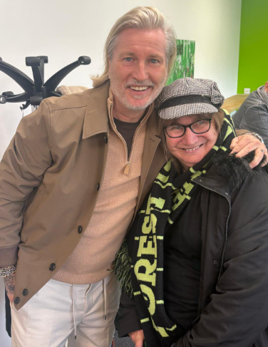 Forest Green Rovers manager Robbie Savage with Sally, who has been prescribed a match ticket as part of the 'Football on Prescription' initiative