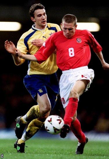 Wales make steady, if unspectacular progress, under Mark Hughes in the 2002 World Cup qualifiers with Bellamy in action against Ukraine’s Andriy Shevchenko