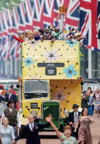 Bus to celebrate the 1950s takes part in the parade,