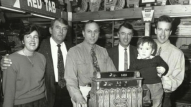 A black-and-white image of six members of the Brown family who have run the business since 1910