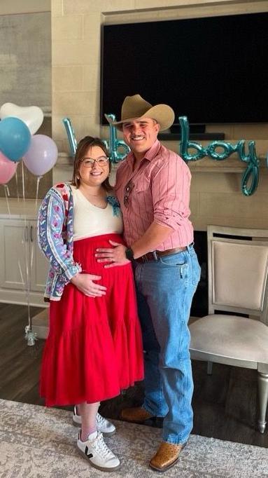 Kyle Rable and his wife expecting a baby boy