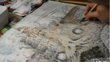 Award winning Japanese artist Koji Yamamura drawing in his studio