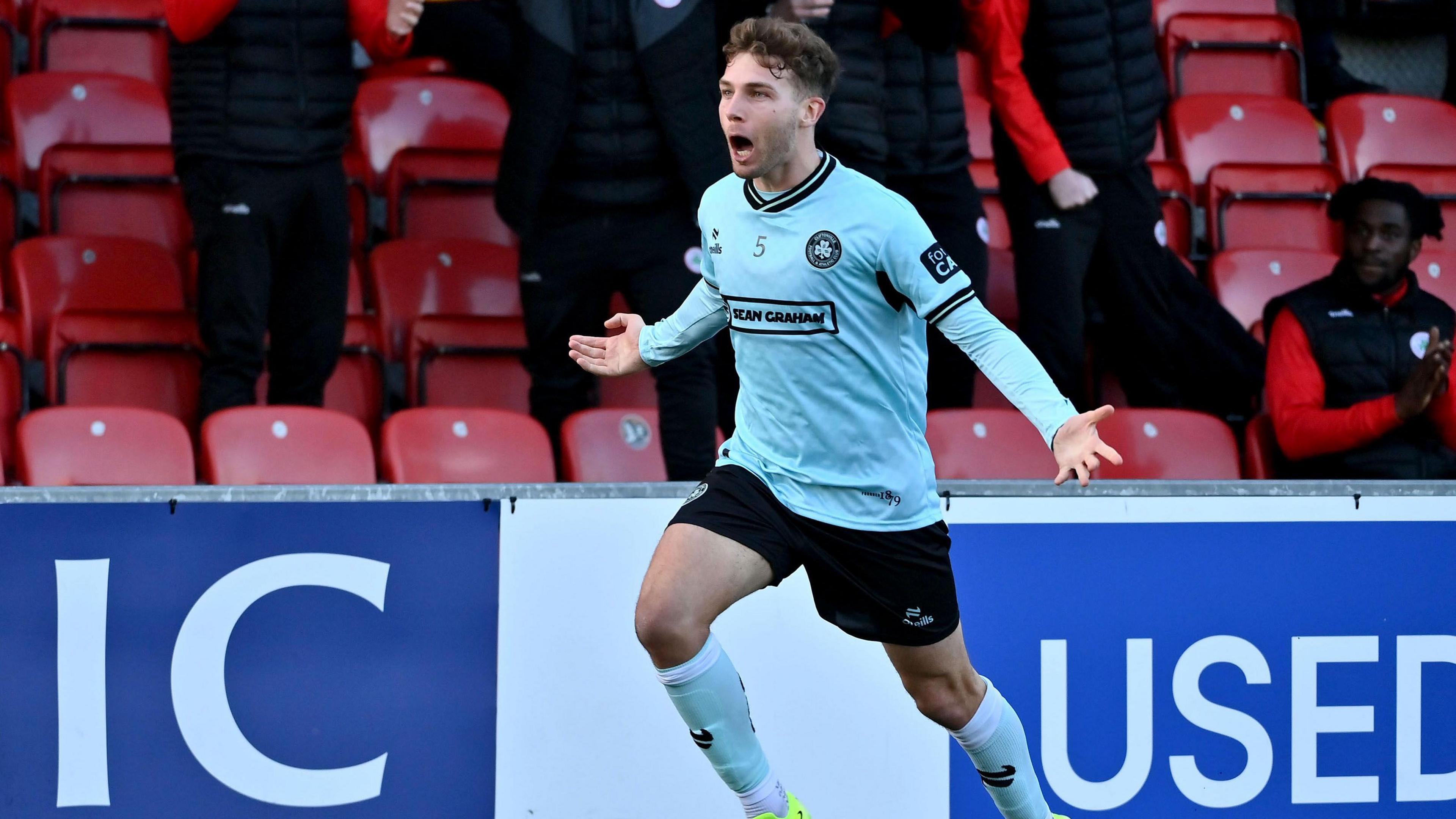 Alex Parsons celebrates scoring