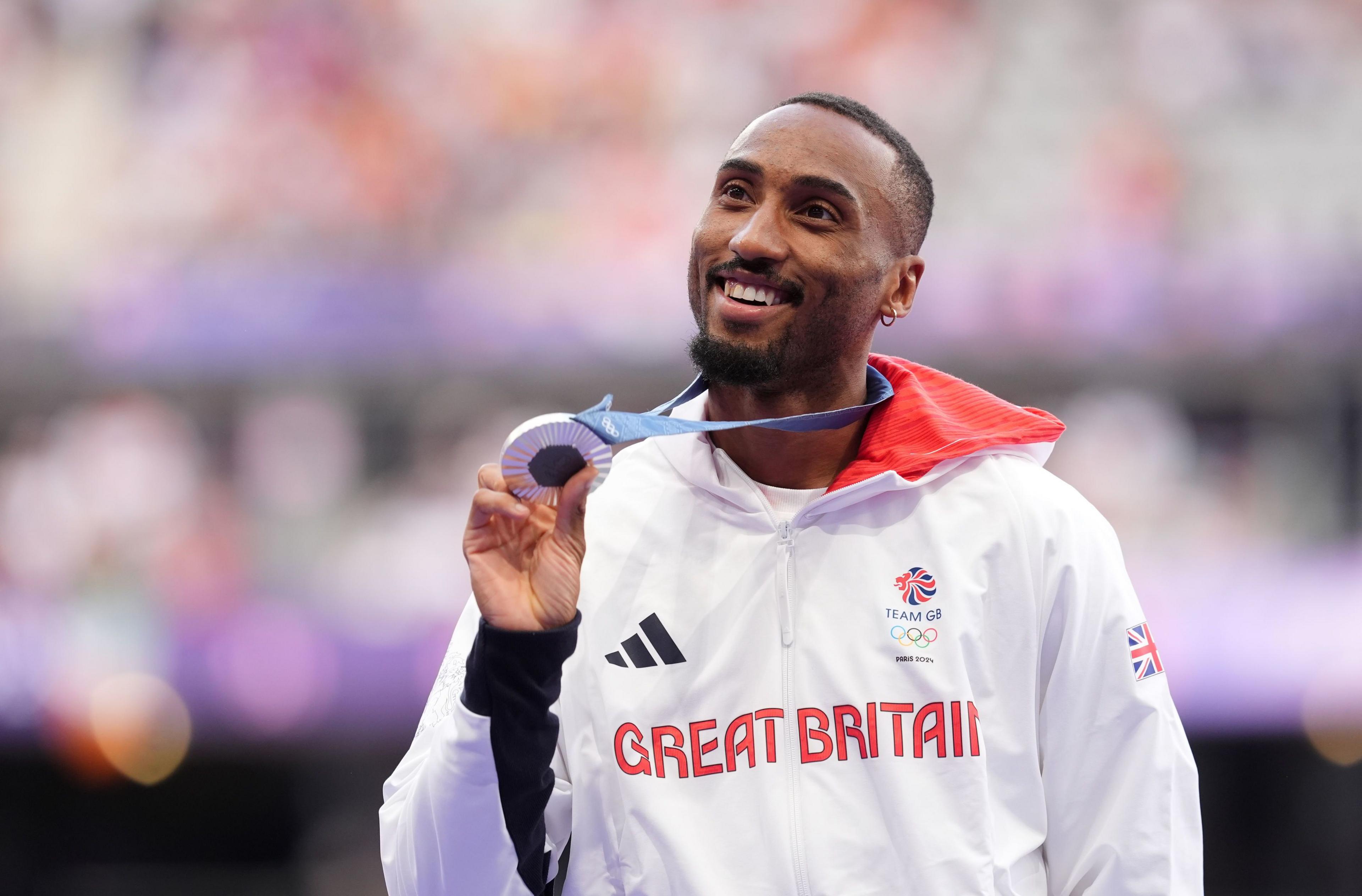 Great Britain's Matthew Hudson-Smith with the silver medal for the men's 400m 