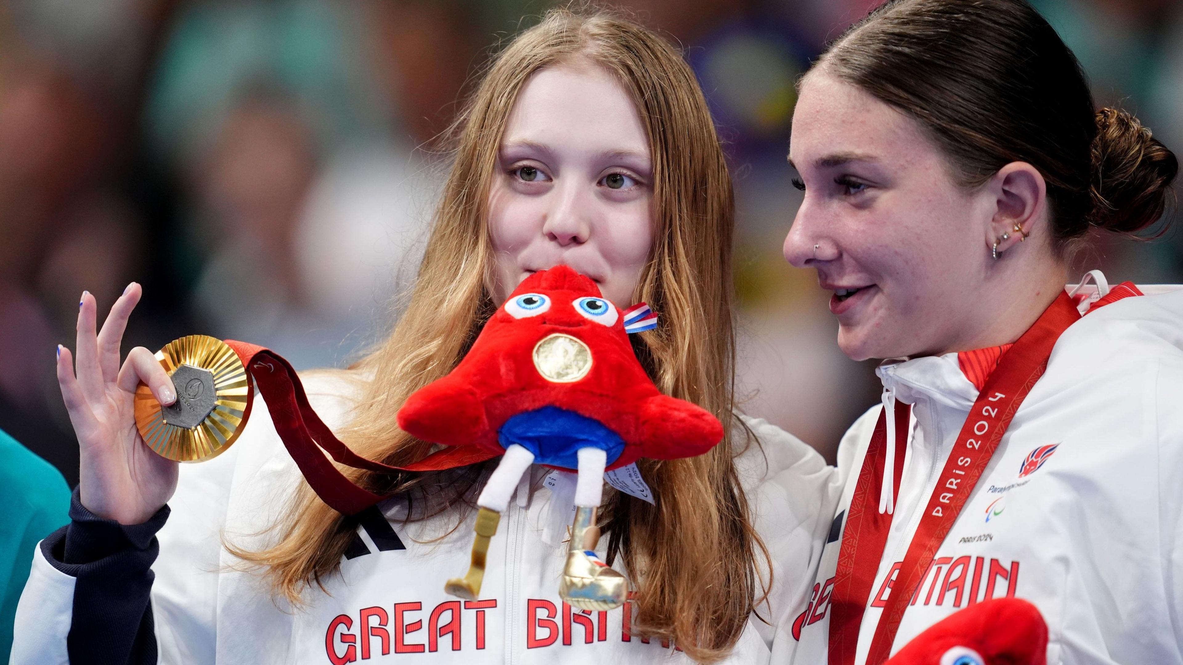 Poppy Maskill and Olivia Newman-Baronuis pose with their medals