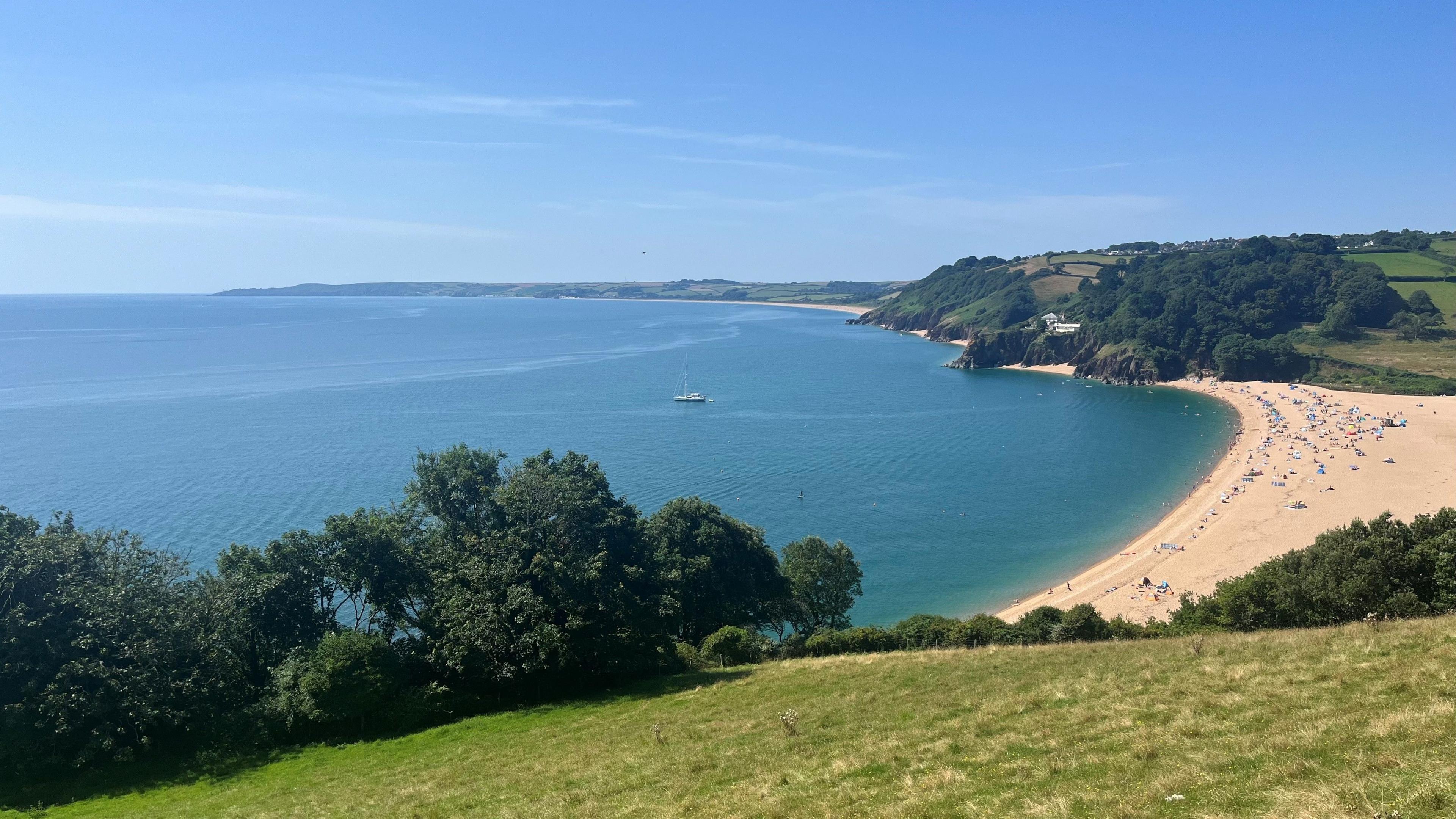 Start Bay in south Devon, with a crescent-shaped beach looking out to sea