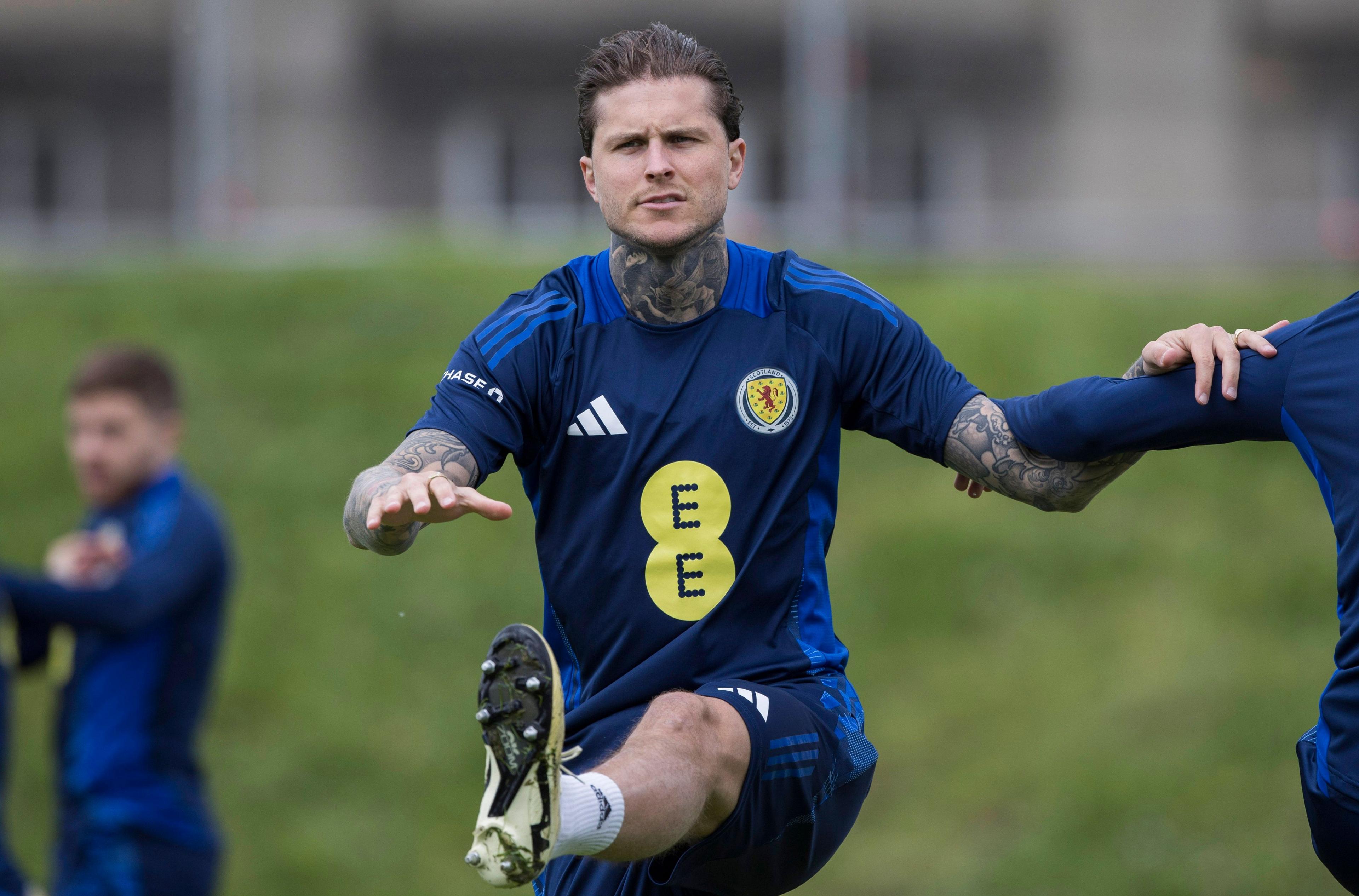 Scotland striker Lyndon Dykes in training