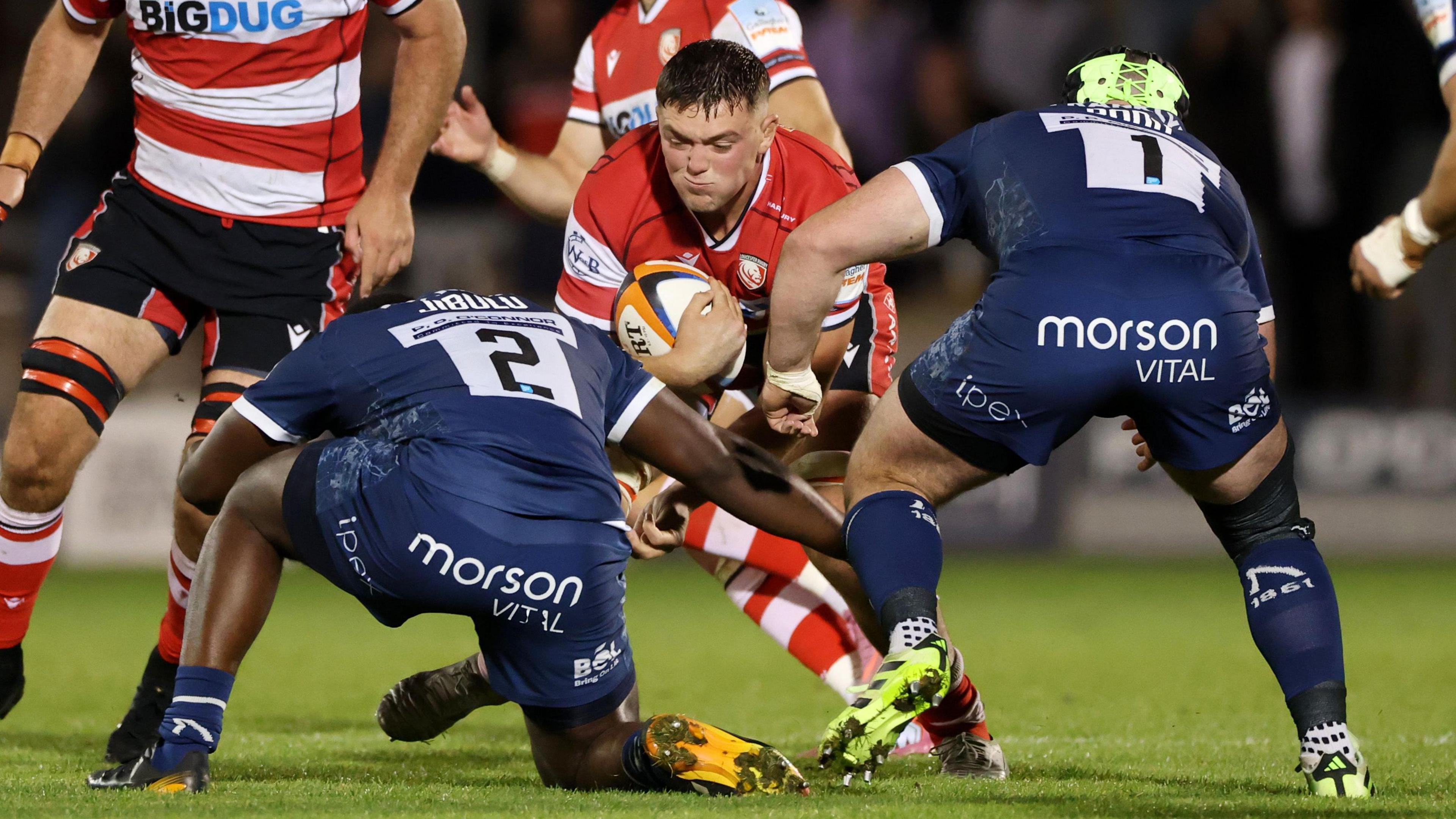 Freddie Thomas carries the ball for Gloucester at Sale Sharks in The Prem