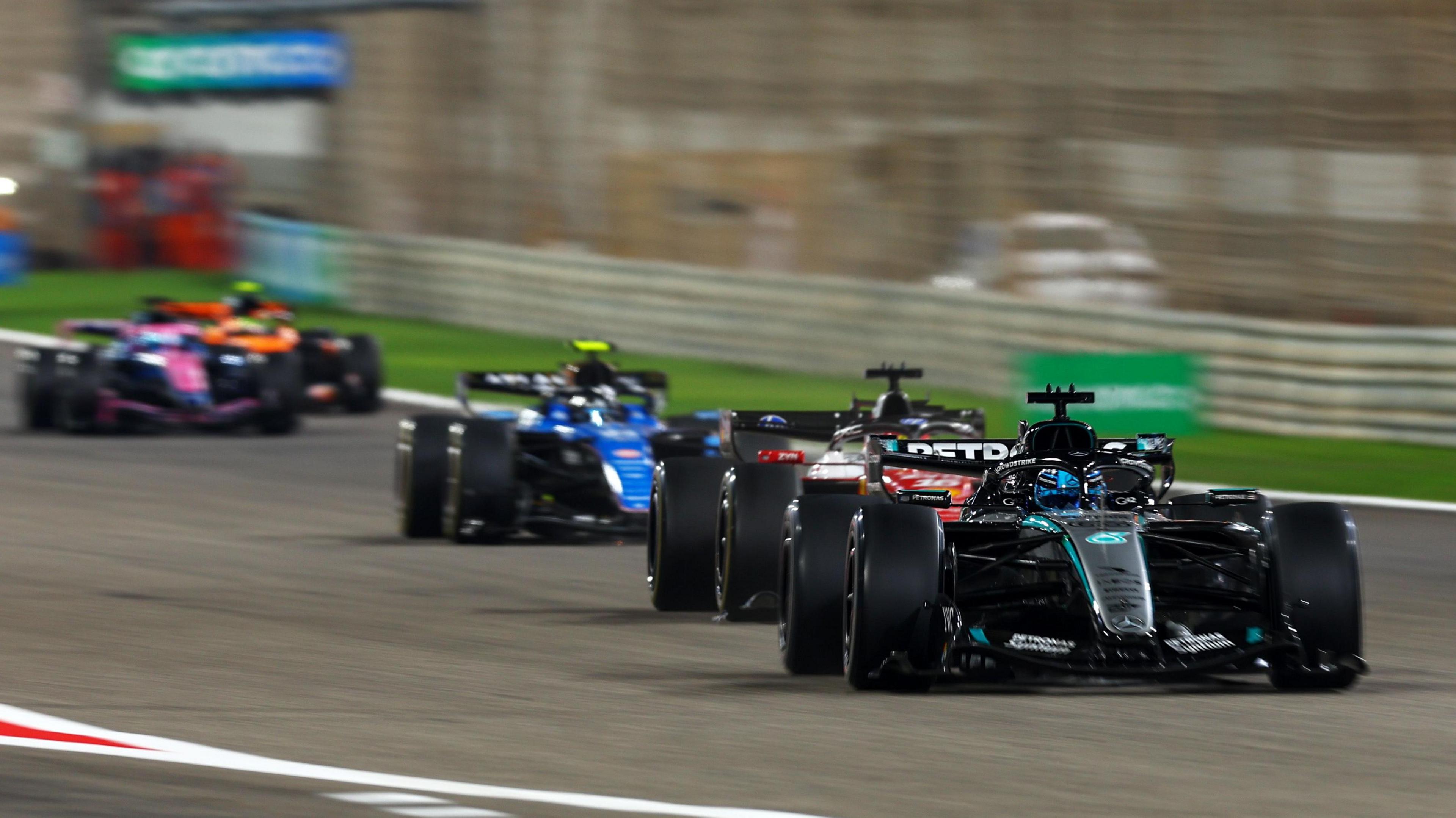 Mercedes' George Russell with Ferrari's Charles Leclerc right behind him and then Williams' Carlos Sainz during pre-season testing in Bahrain
