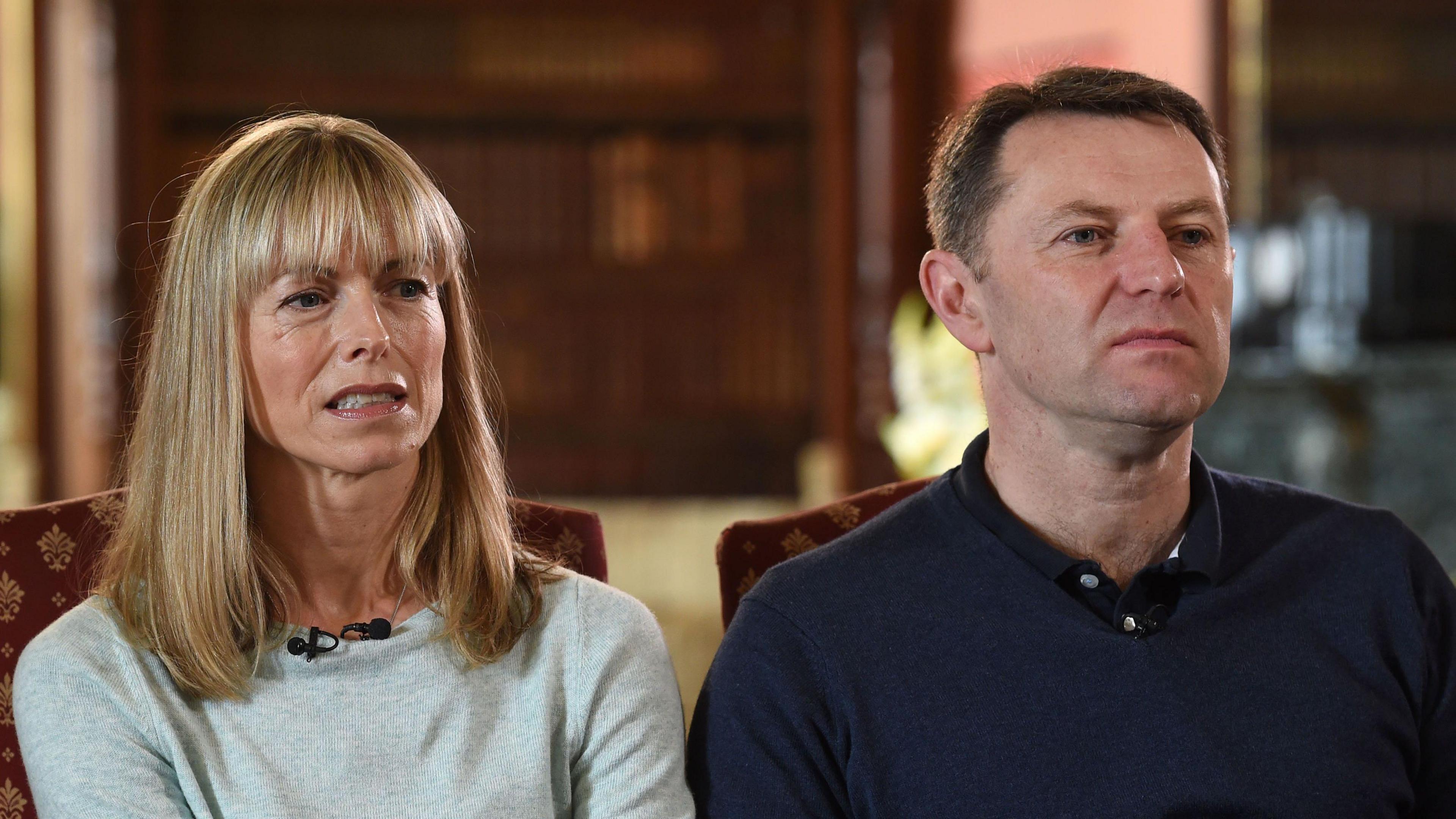 A couple speaking on a TV documentary