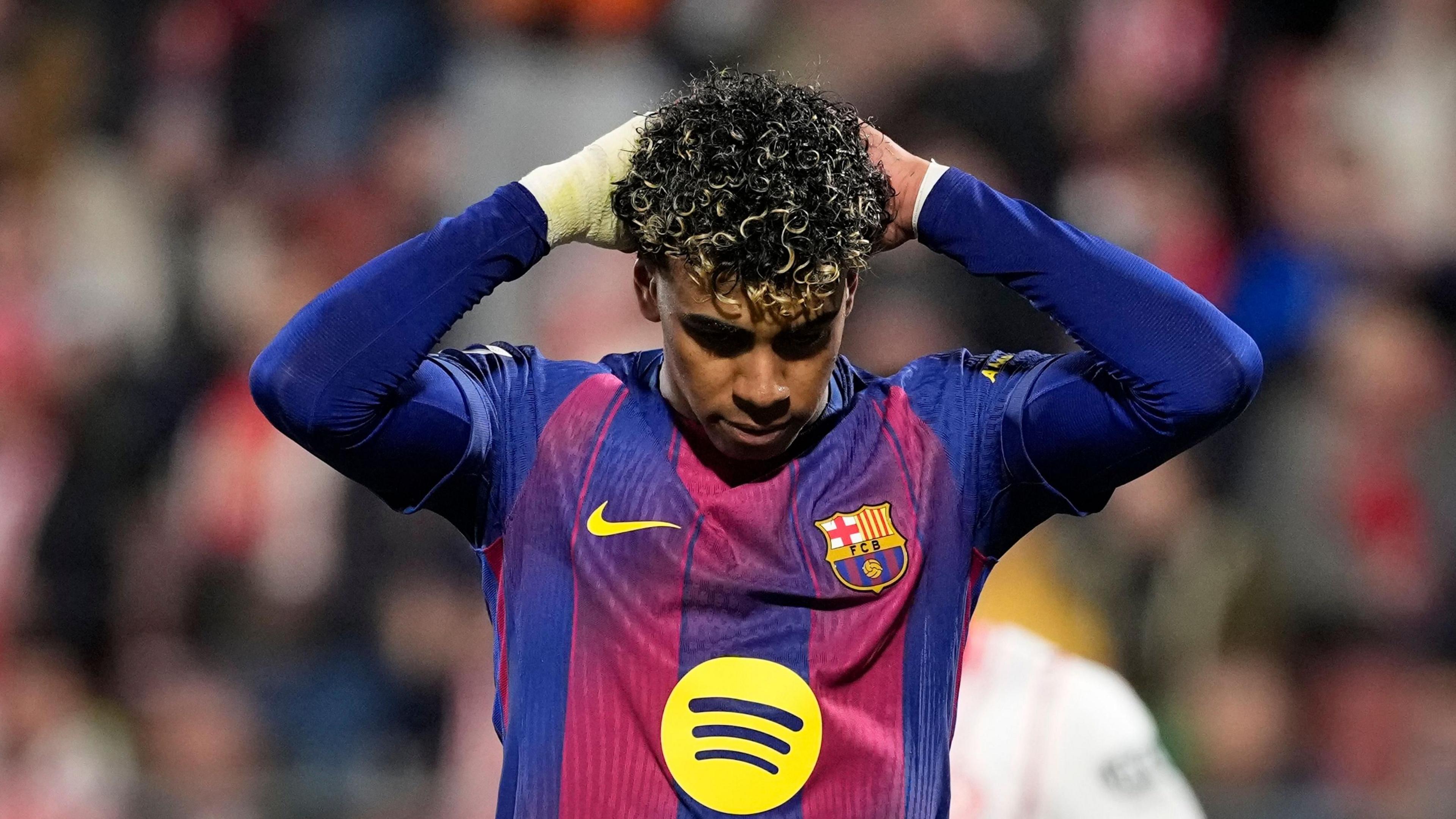 Lamine Yamal puts his hands to his head after missing a penalty