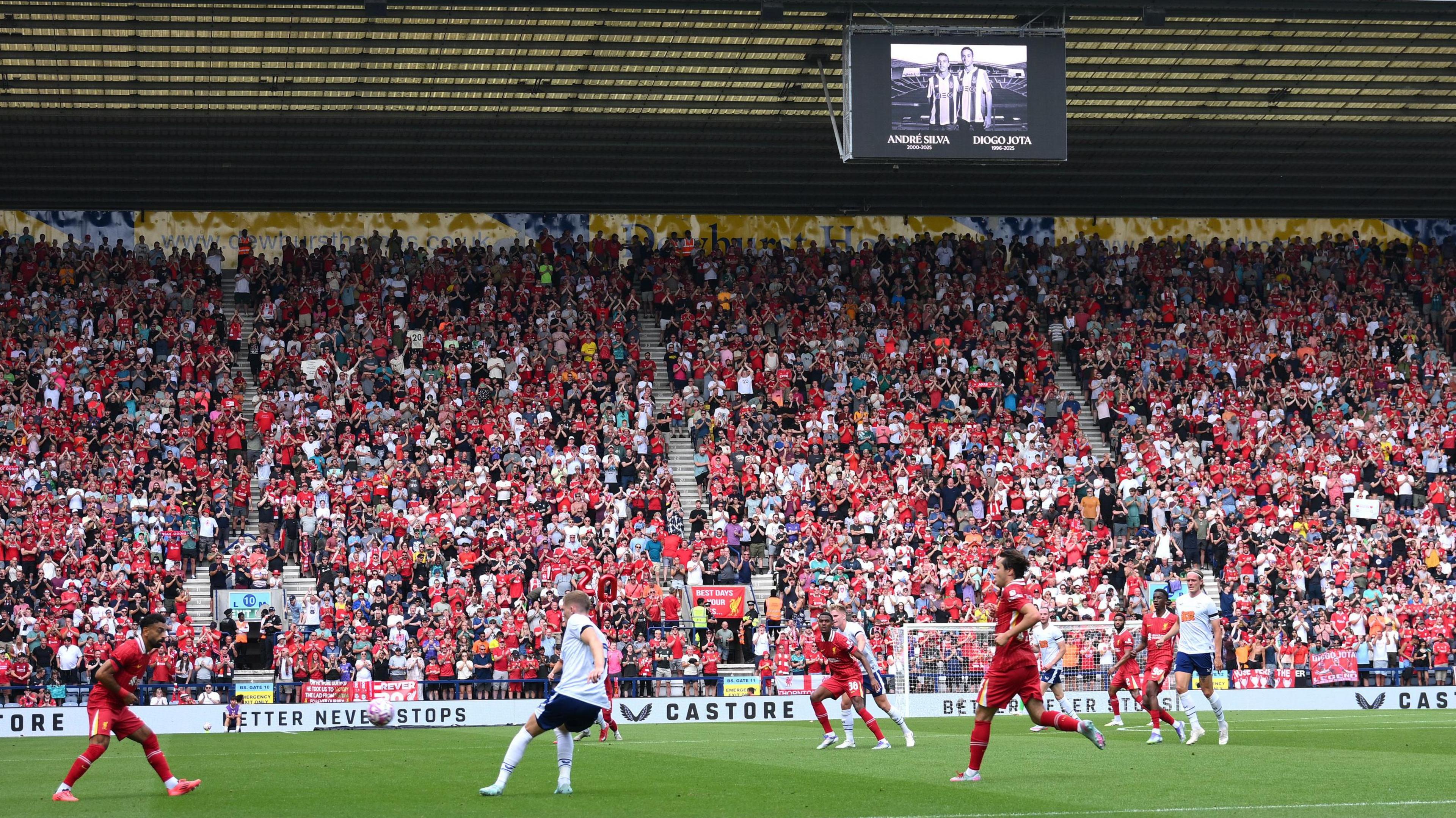 Liverpool fans sing Diogo Jota's song in the 20th minute as the big screen shows a tribute to him and his brother Andre Silva