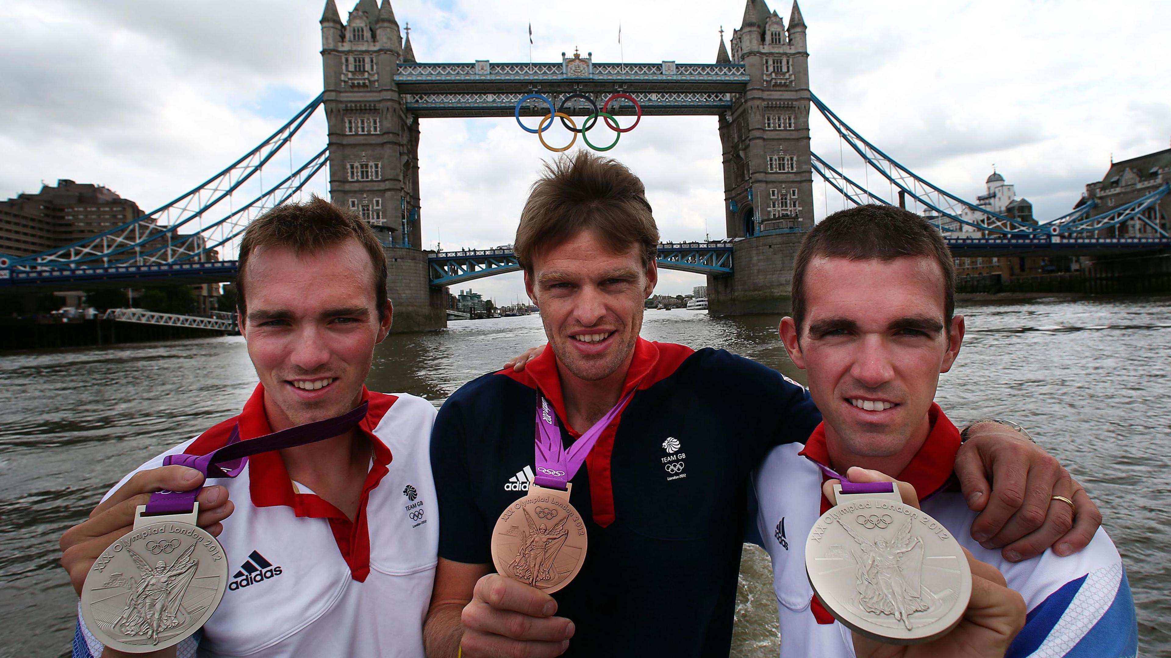 Peter Chambers, Alan Campbell and Richard Chambers with their medals from London