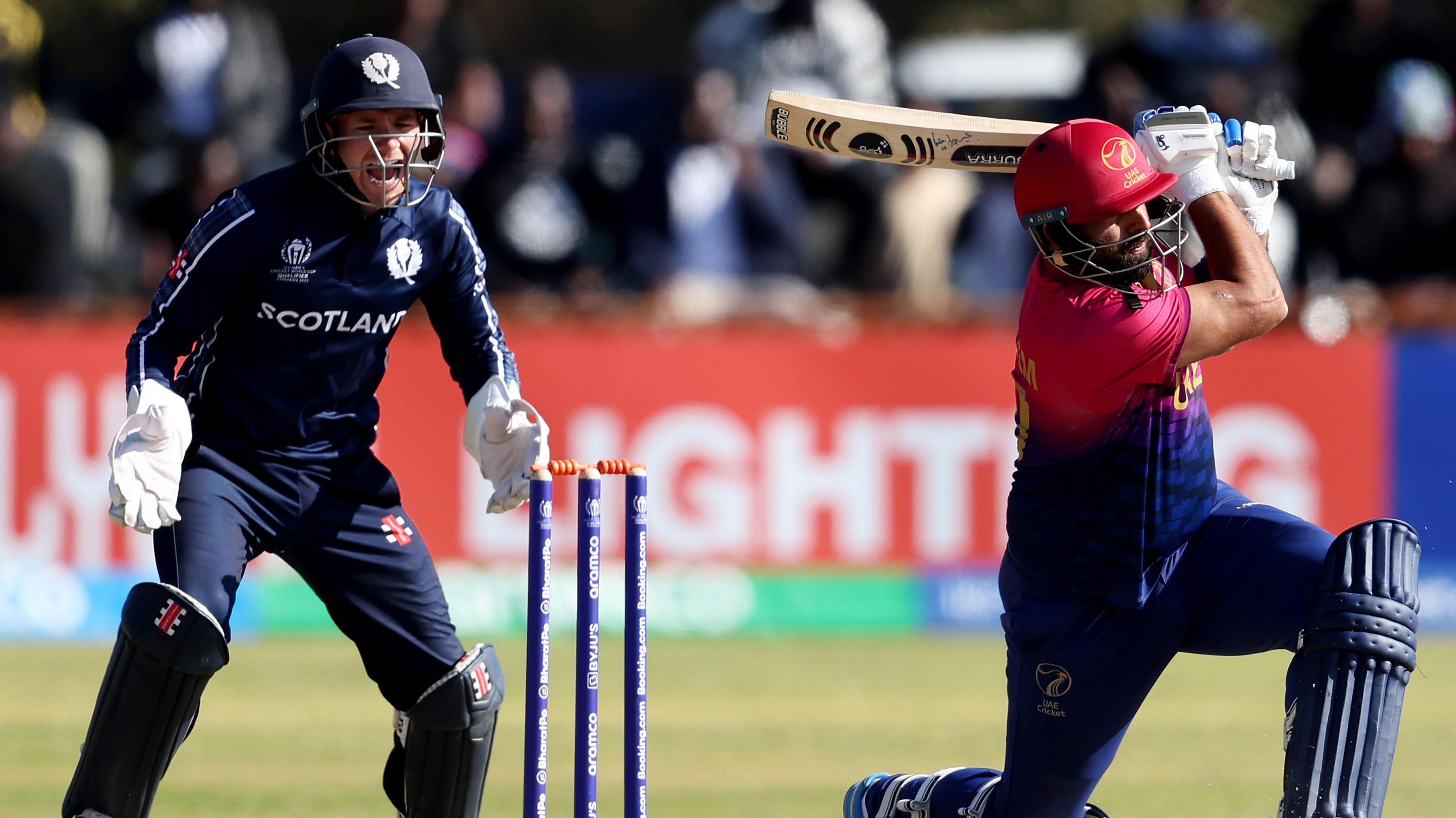Scotland wicketkeeper Matthew Cross watches as UAE batter Mohammad Waseem is trapped lbw in a game in 2023