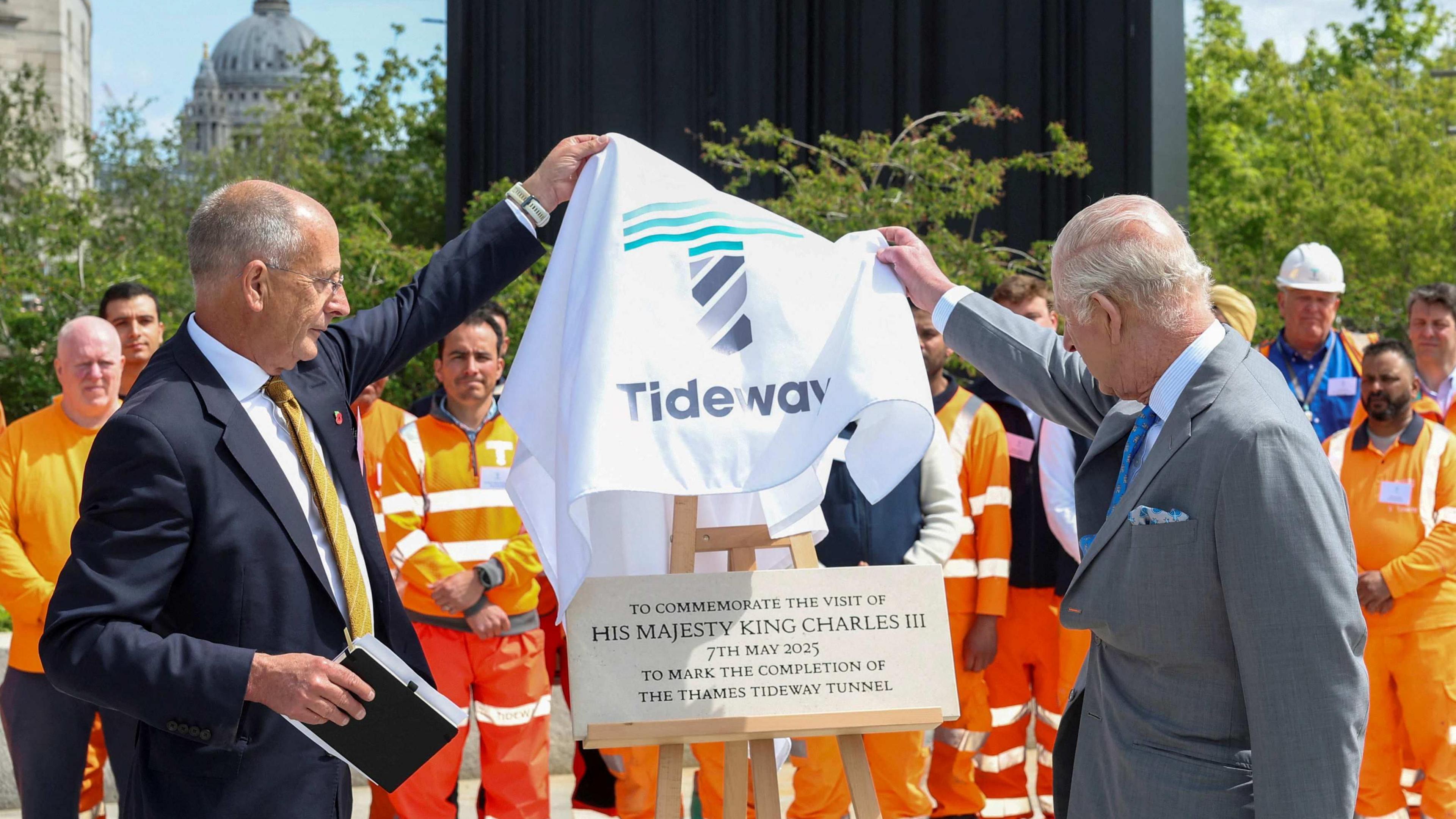 King Charles III with Andy Mitchell (left), CEO of Thames Tideway Tunnel Project, during a visit to the Thames Tideway Tunnel project in London.