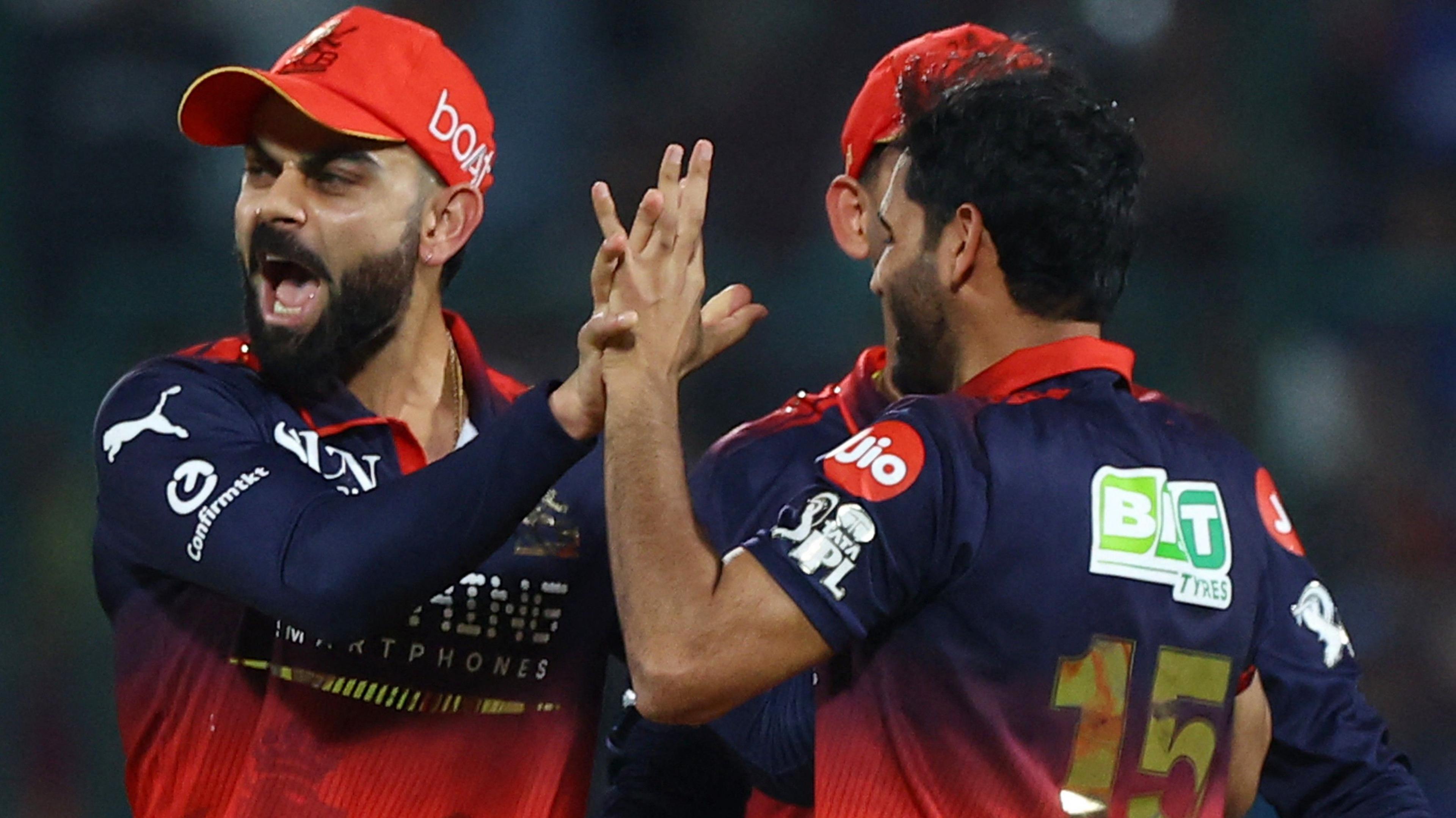 Virat Kohli celebrates a wicket for RCB