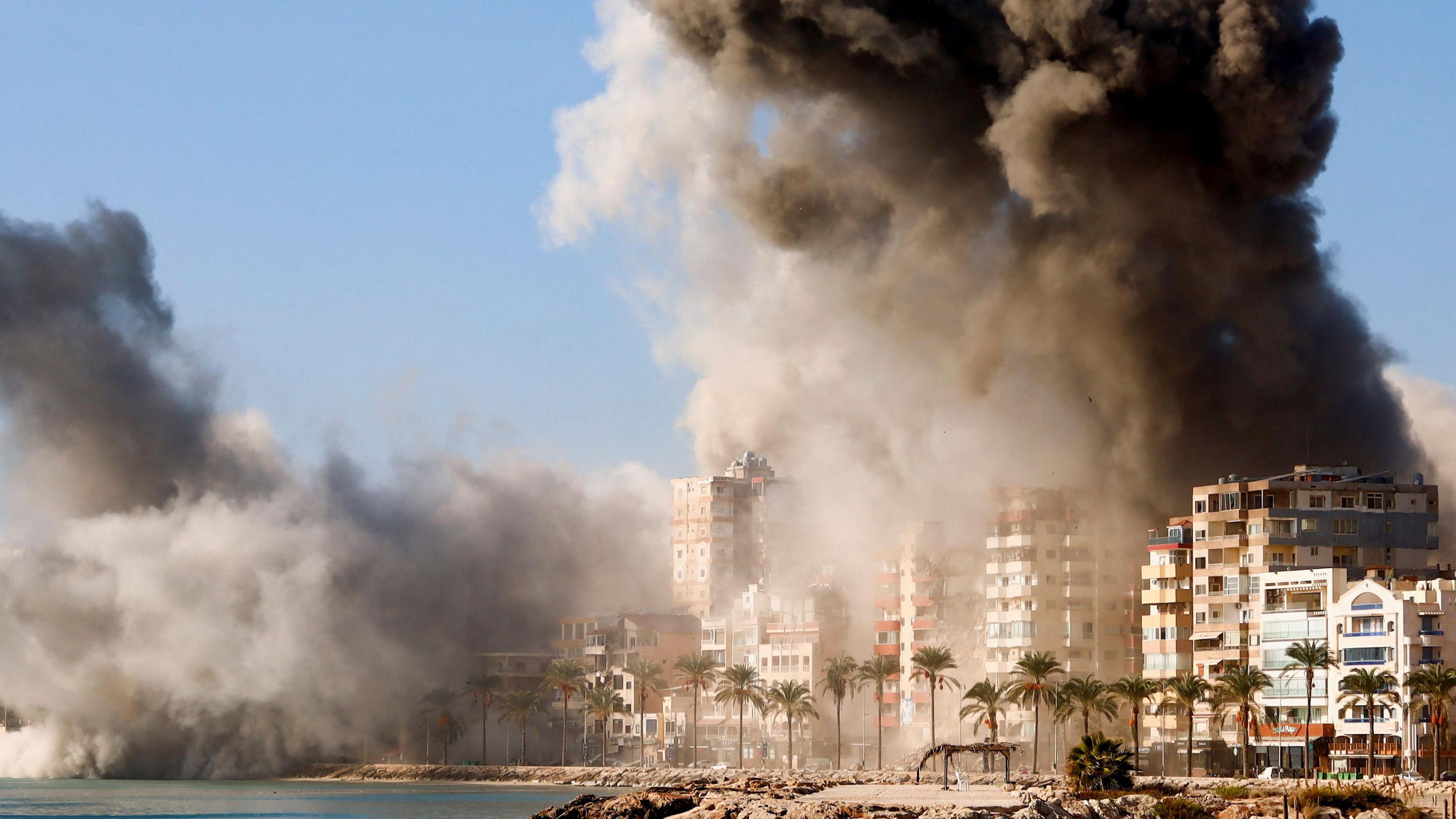 Smoke billows over the UNESCO-listed port city of Tyre after Israeli strikes