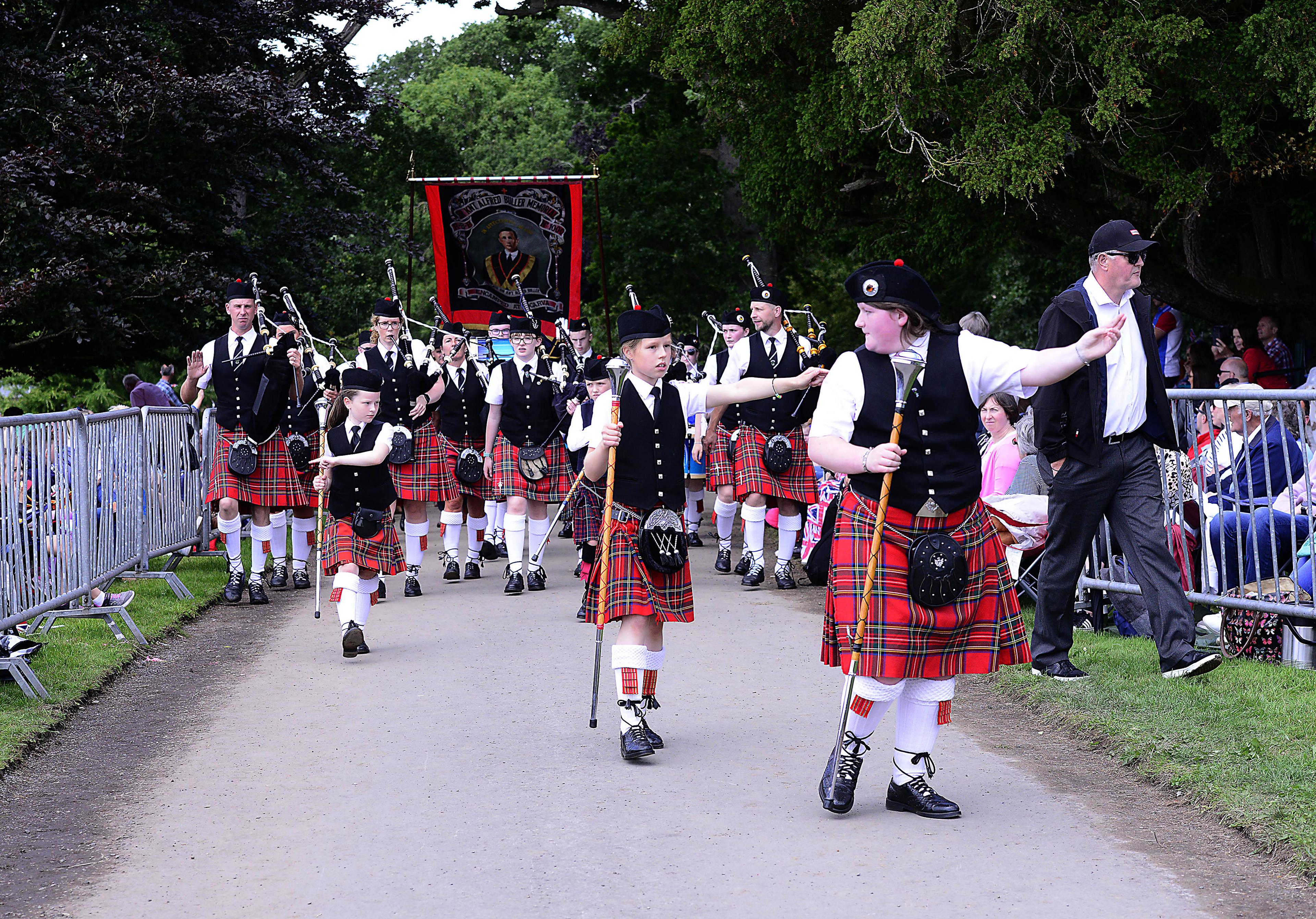 A pipe band parades 