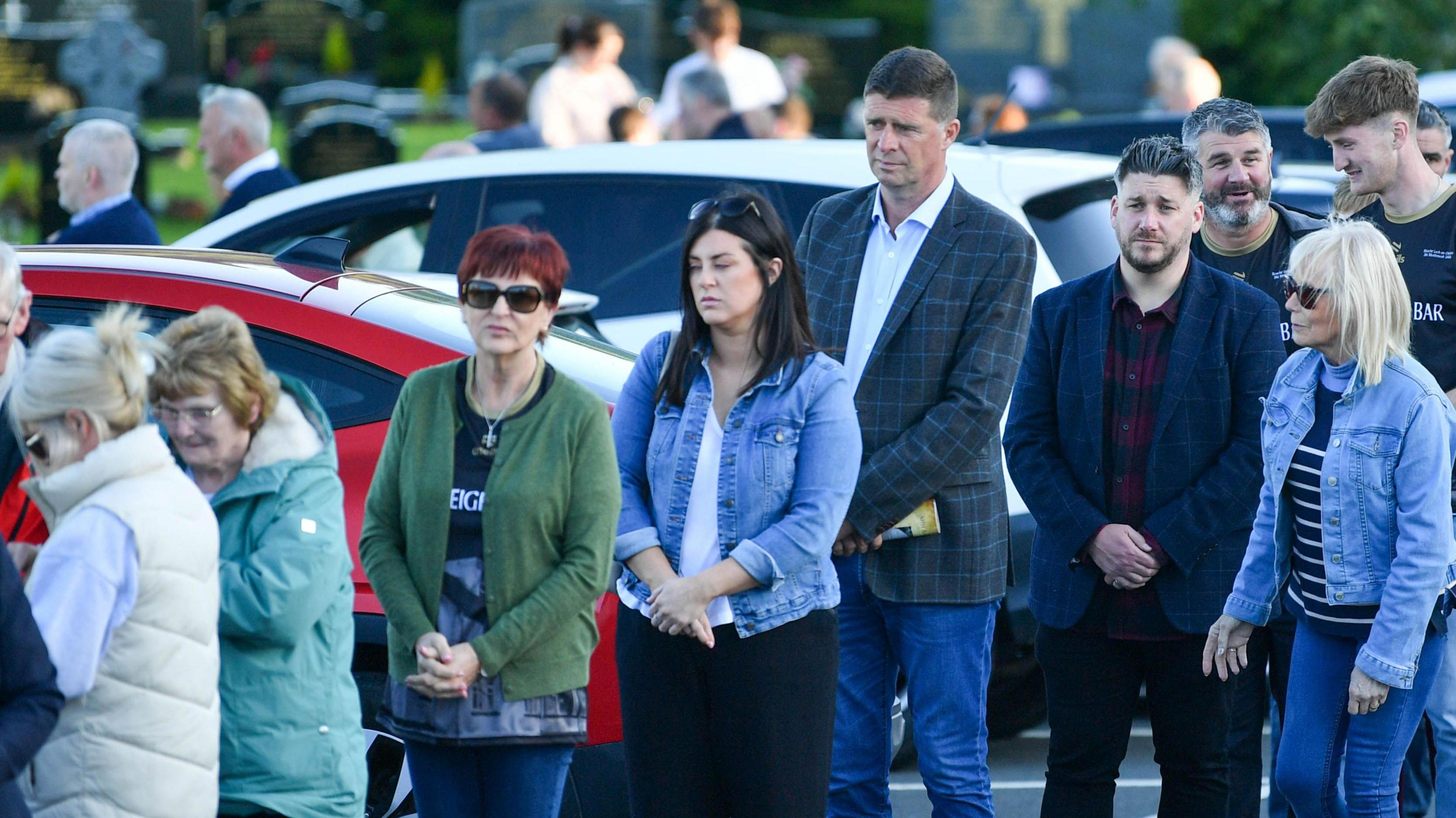 A gathering of people at the memorial 