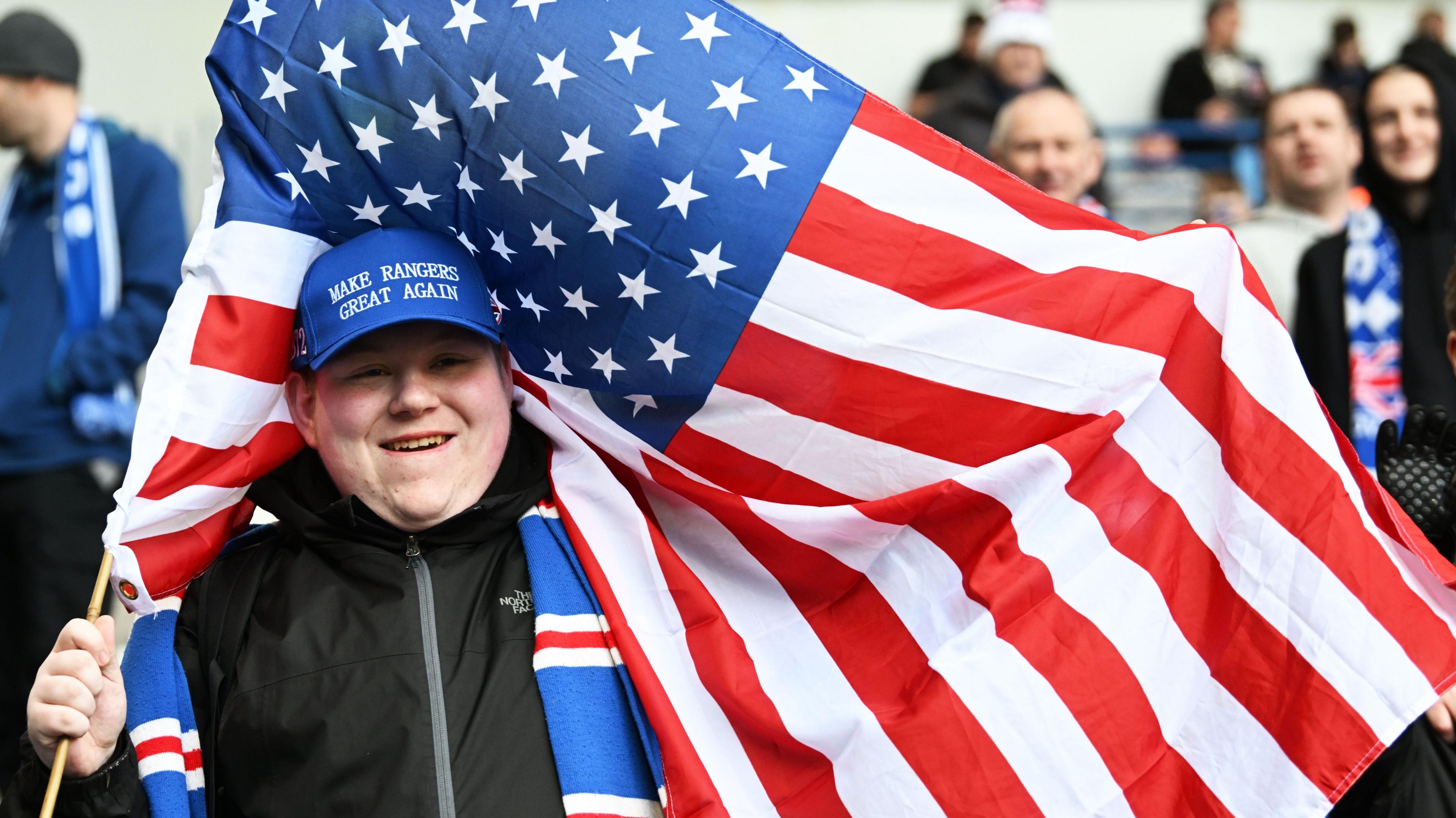 Rangers fan with a US flag